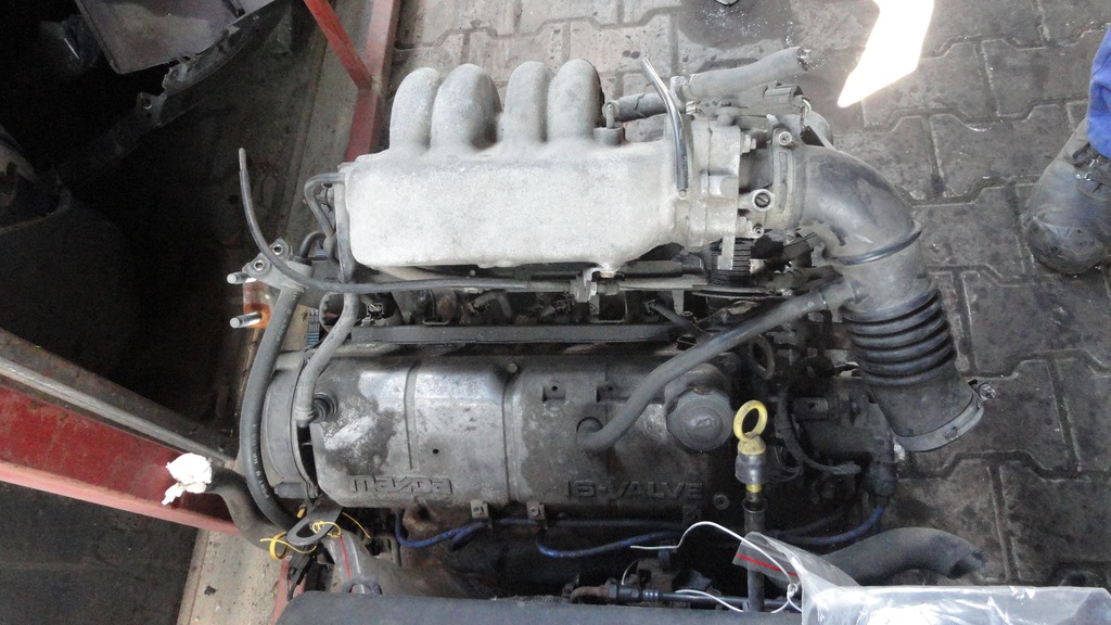 motor compl. mazda 323 bj 13b  (#)