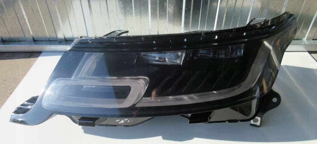  faro izq. range rover sport (#)
