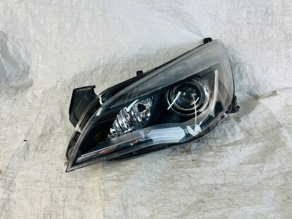  faro izq. astra j 4 iv bi xénon torsional (#)
