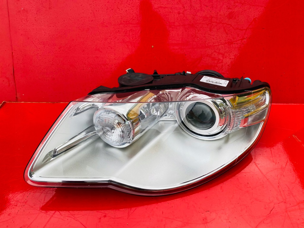 faro izq. vw touareg 7l bi xénon  giratorio  (#)