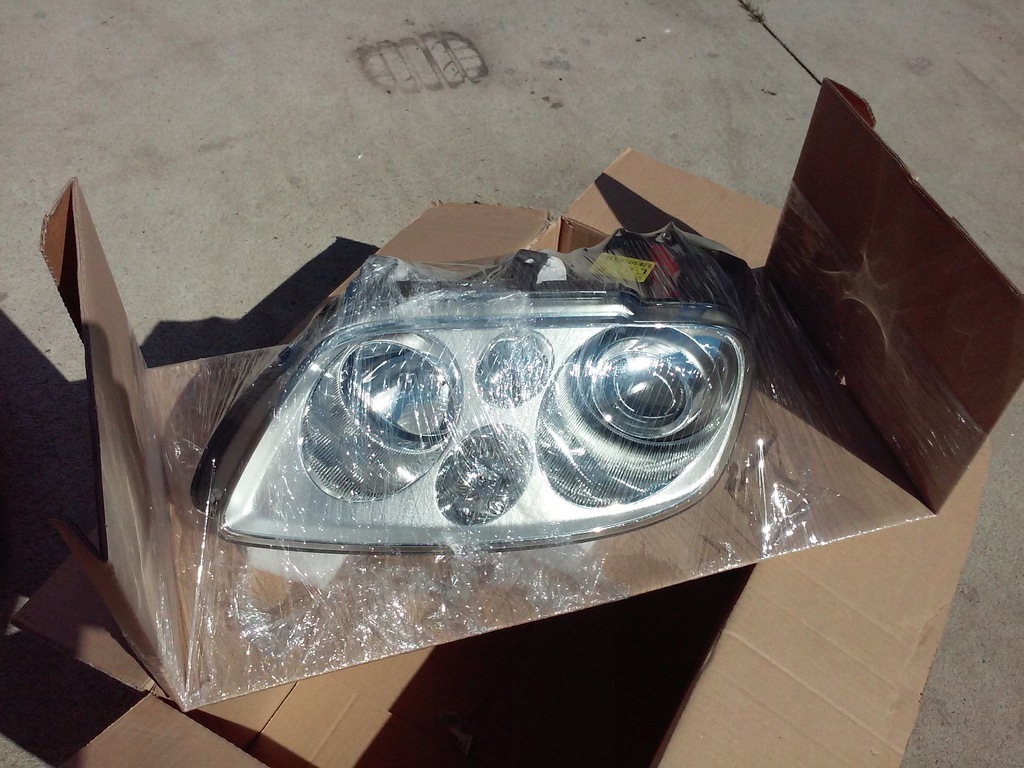 vw caddy touran bi xenon  nuevo  original (#)