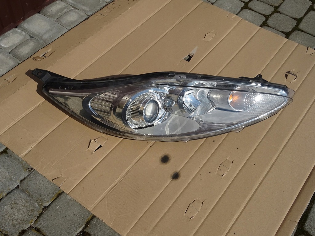 ford fiesta mk7 faro delantera der.. lentilla (#)