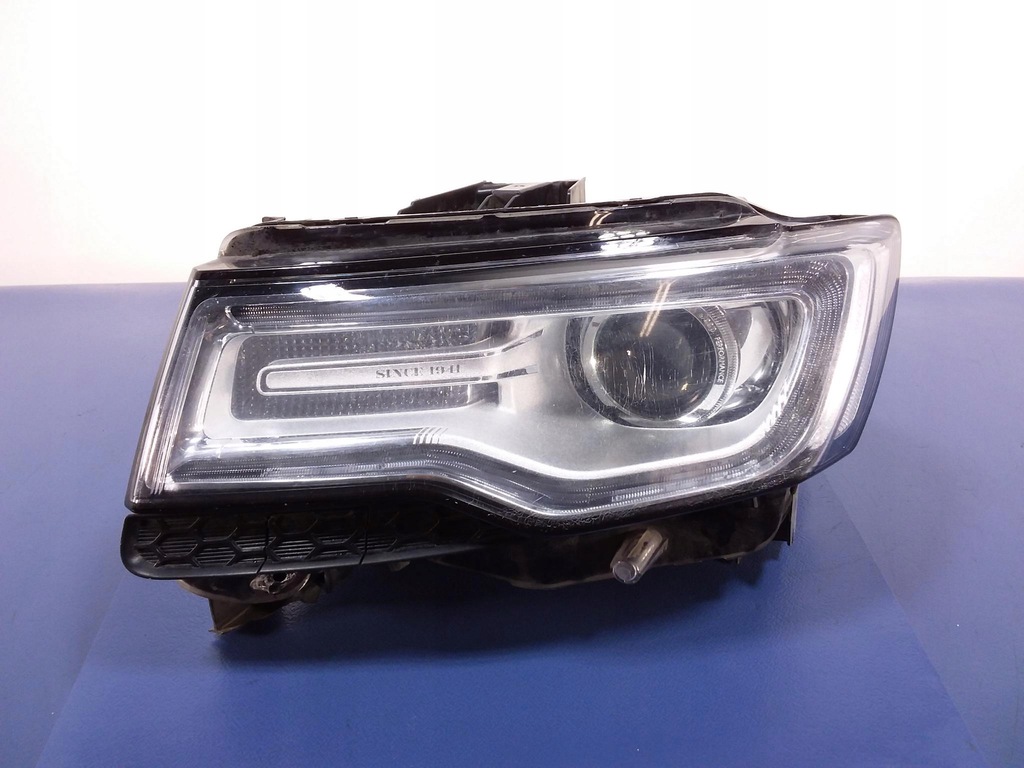 grand cherokee wk2 lift faro izq. bixenon (#)