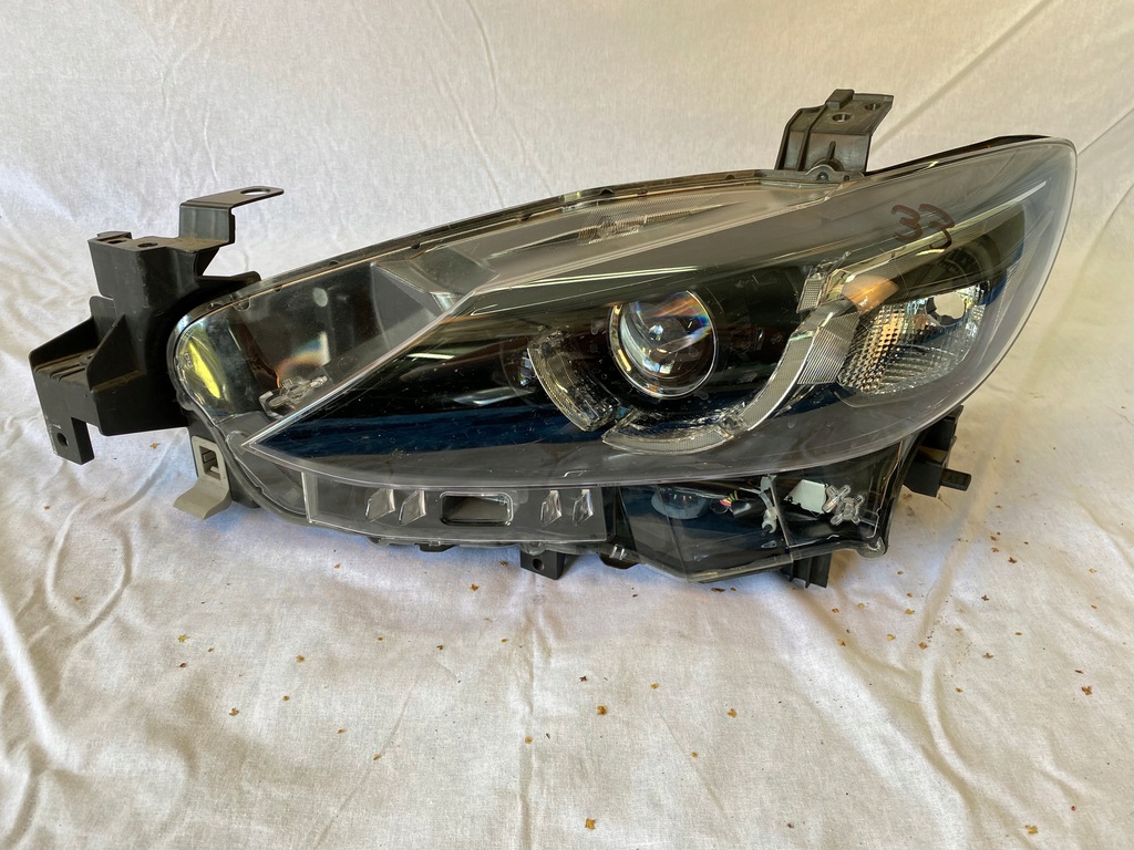  faro izq. mazda 6 (#)