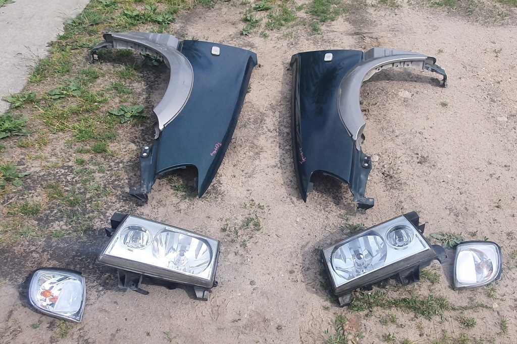 terrano ii 2 faro izq. der.. europa compl (#)