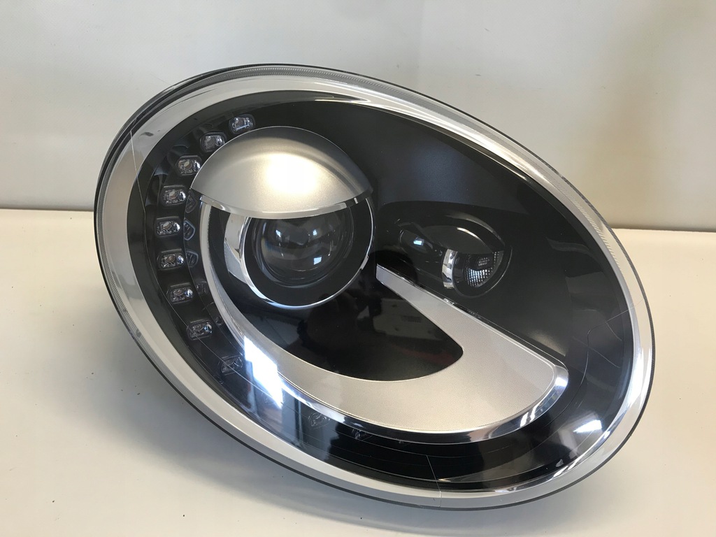 vw new beatle faro xeno delantero der.. 5c1941032e (#)