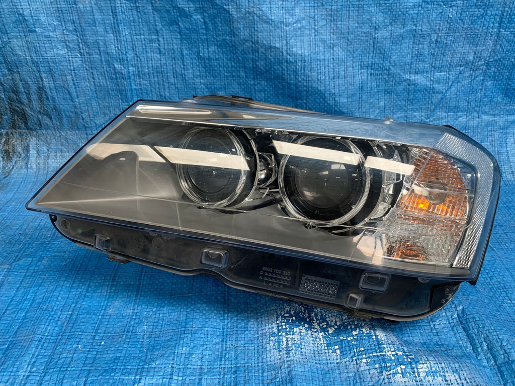 bmw f25 izq. faro xénon   (#)