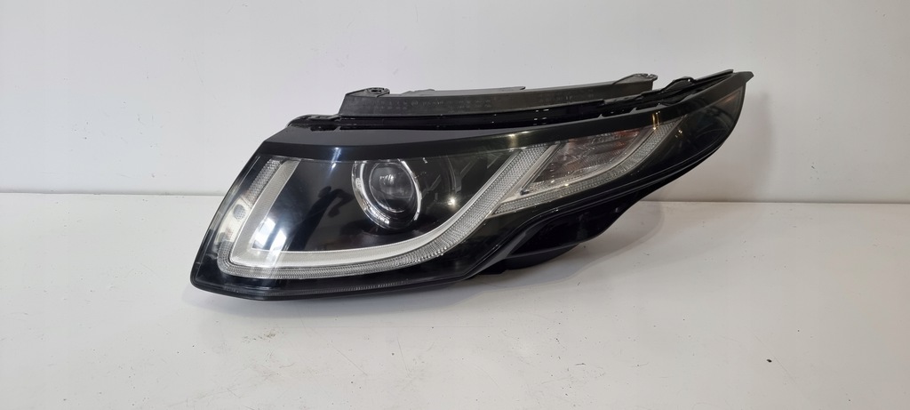  faro range rover evoque gj32 13w030 ed izq. (#)