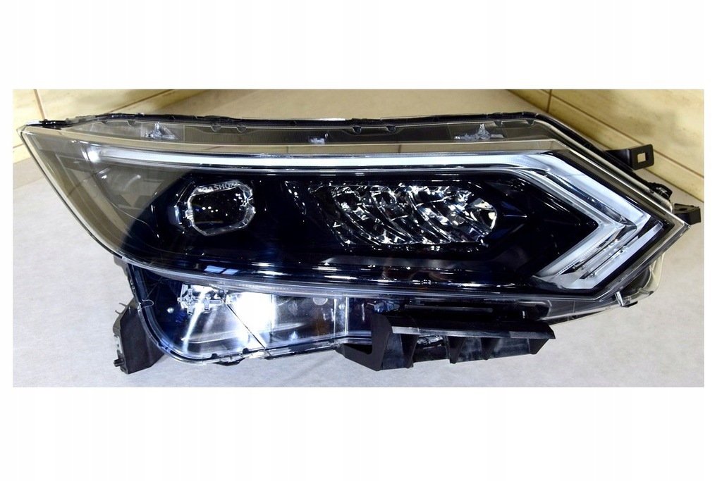 qashqai ii lift 17 100 19011 delantero faro  (#)