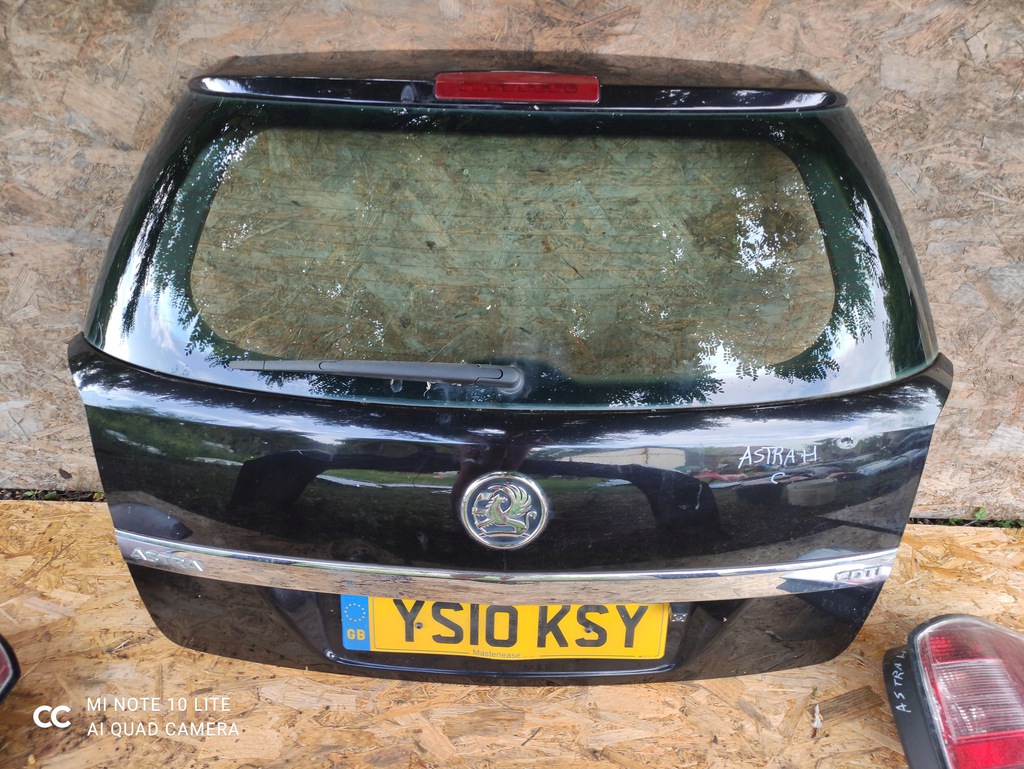 solapas trasero parachoque paragolpes faros opel astra h 3 z20r ranchera ($)