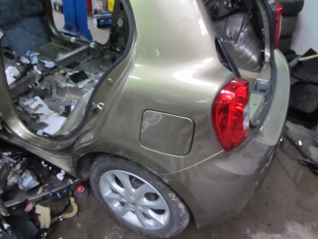 micra k13 10 16r aleta corte izq.  trasero ($)