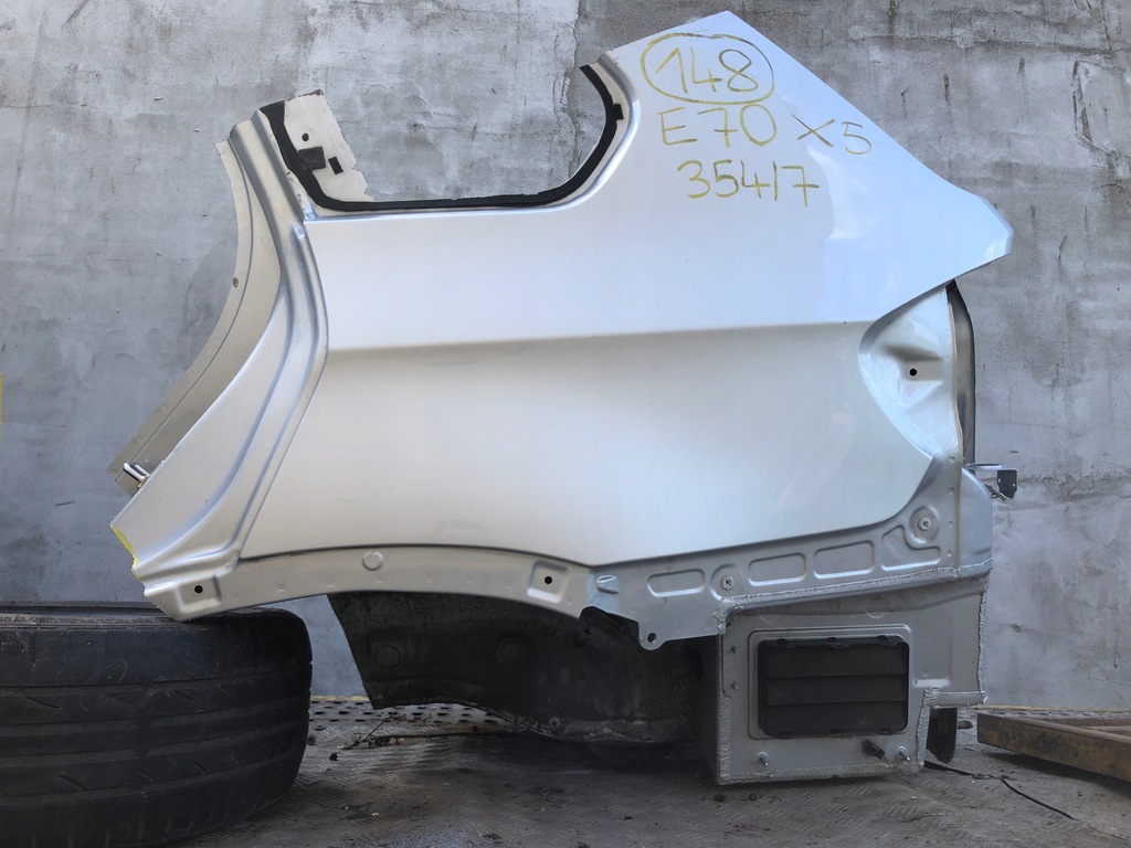 bmw e70 x5 aleta corte izq.  trasero 354/7 ($)