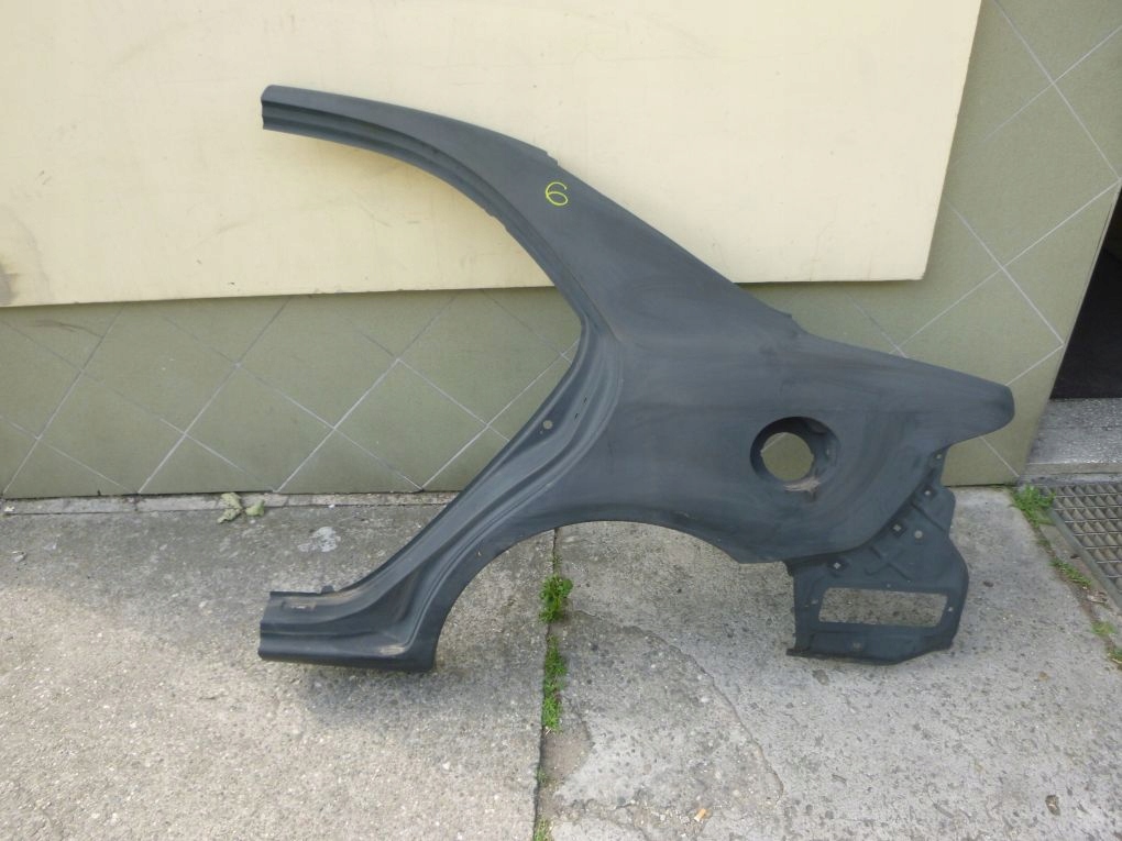 mazda 6 sedan 02  aleta trasero izq.  ($)